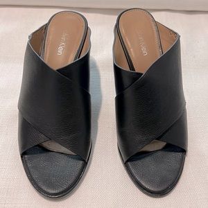 Black Calvin Klein open toed heeled slides